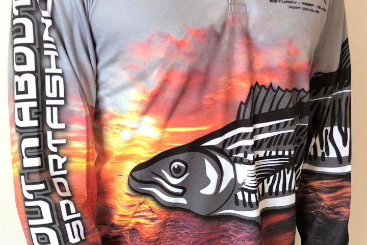 a stack of flyers on a table