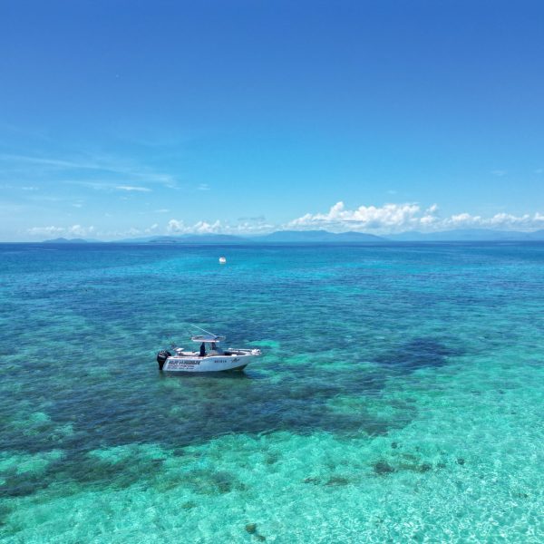 a small boat in a body of water