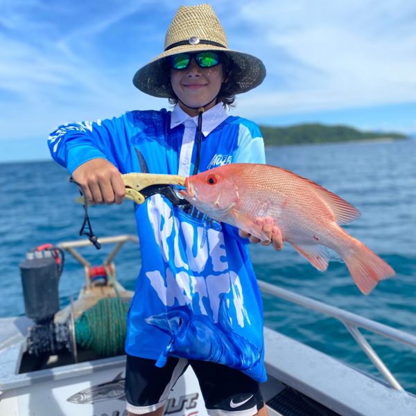 a man wearing a blue hat
