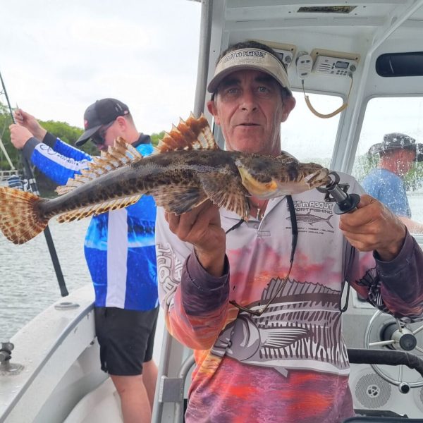 a man riding on the back of a truck